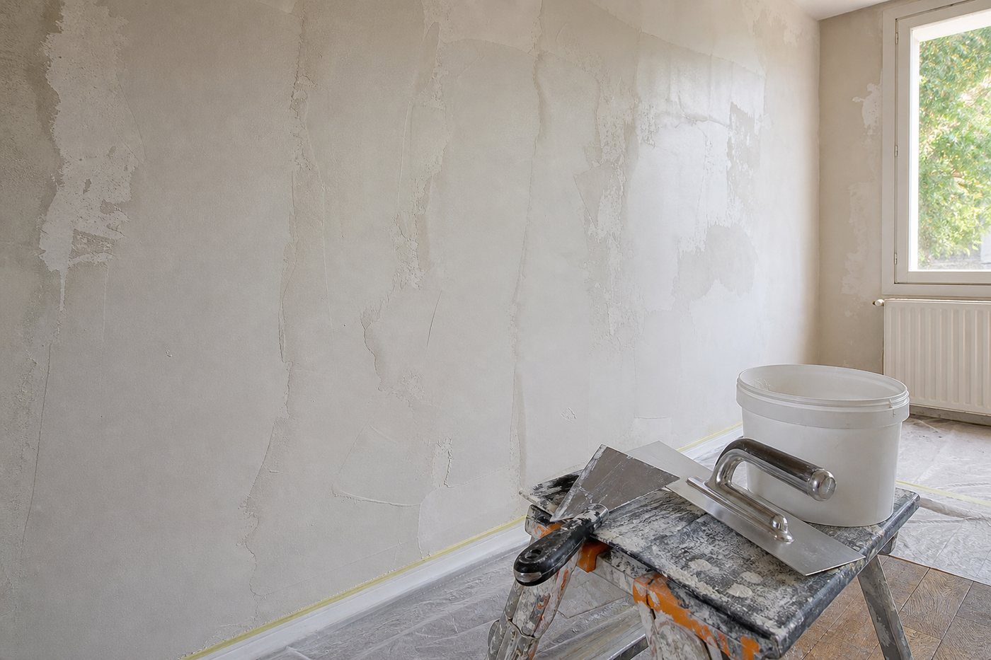 Enduit garnissant ou toile de rénovation : choisir